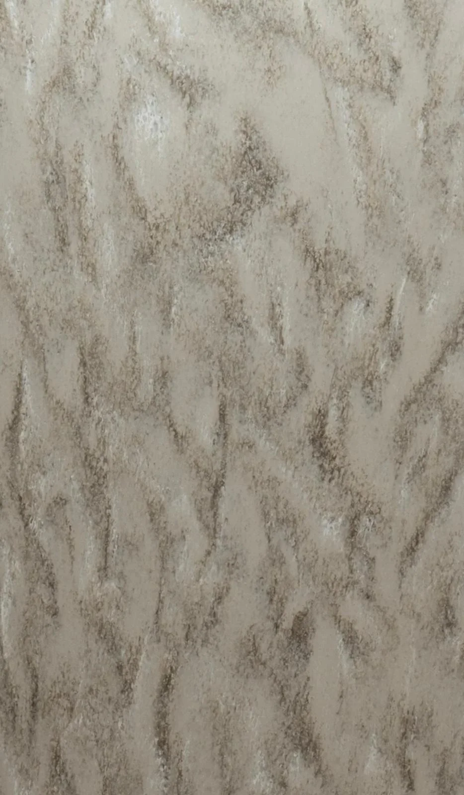 Close-up of beige and taupe marble-look surface with brown veining and textured stone pattern