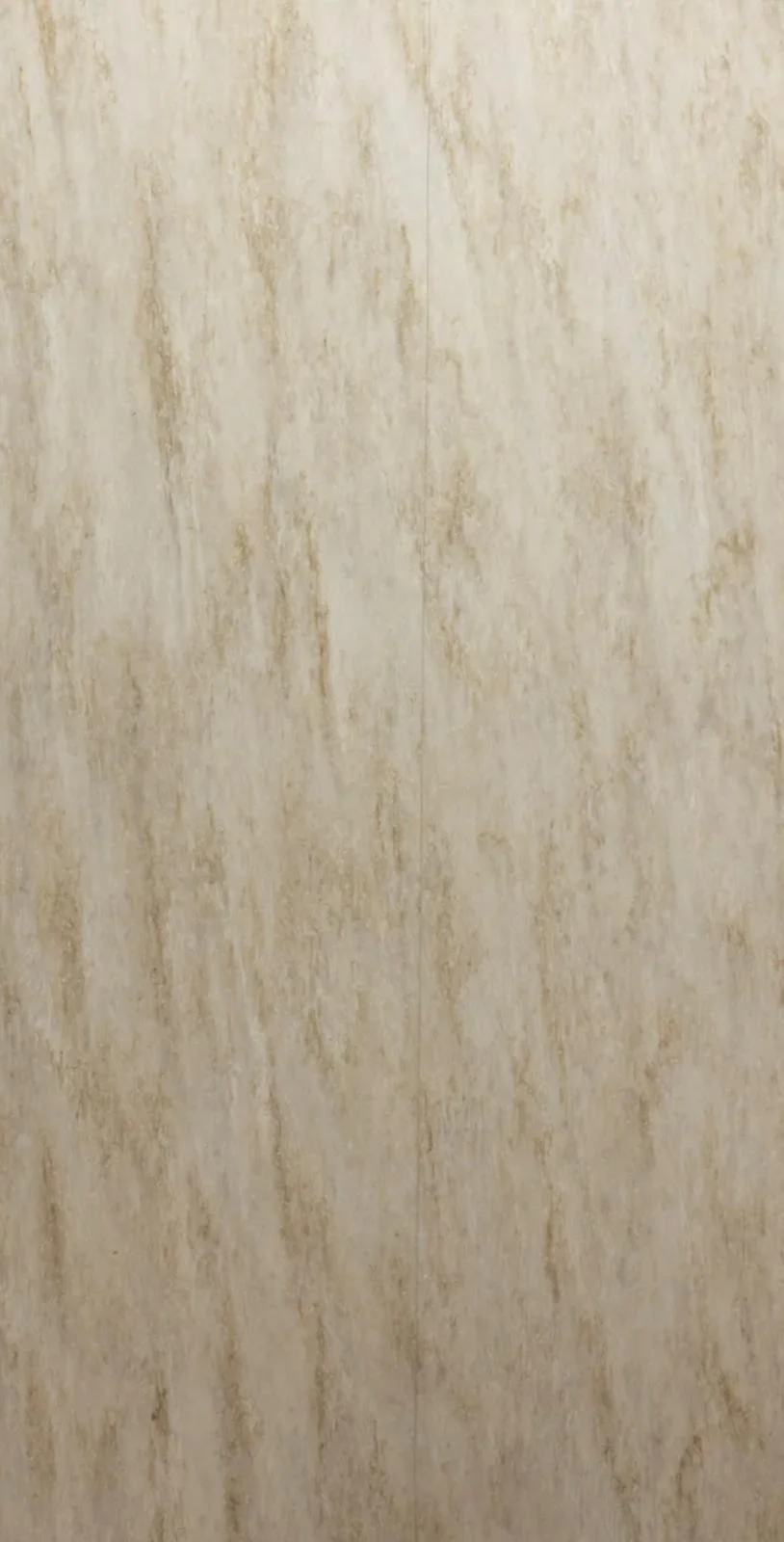 Cream and tan travertine-look wall panels with vertical veining and a narrow flush seam